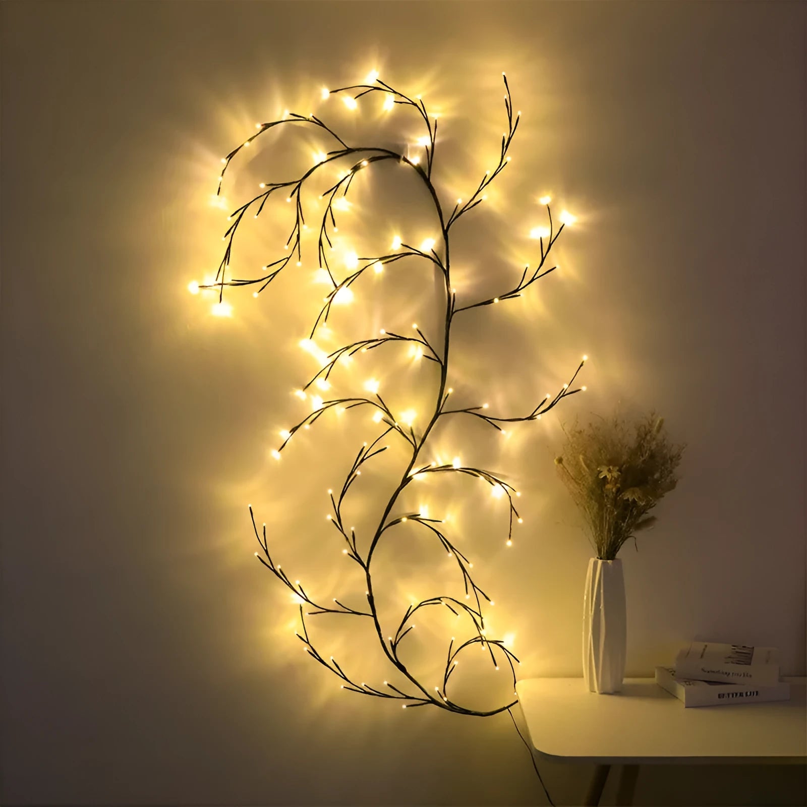LED rattan tree light string arrangement with warm white illumination for decorative room lighting