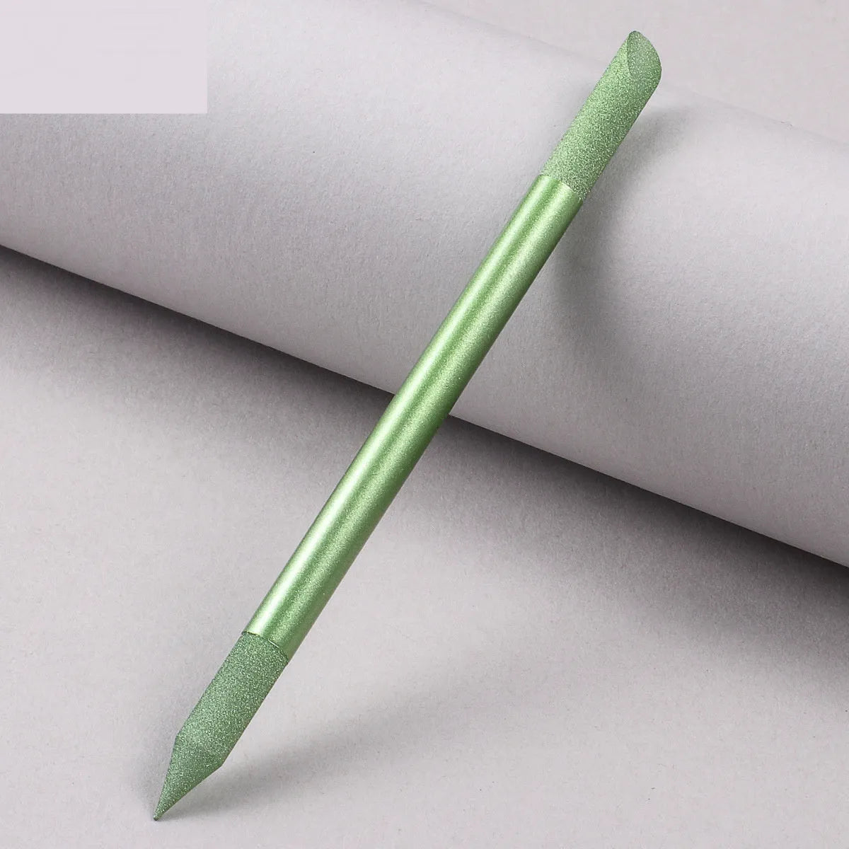 Nano glass nail polishing frotton tool in various solid colours.