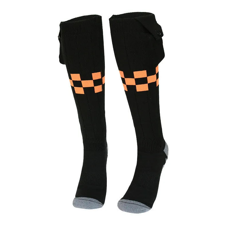 Black and grey mesh smart heating socks with USB cable and battery for skiing.