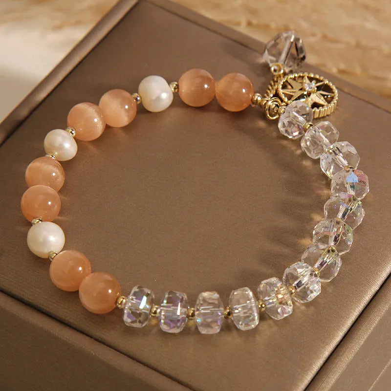 Orange eight Awn star bracelet with gold-plated inlay and artificial gemstones