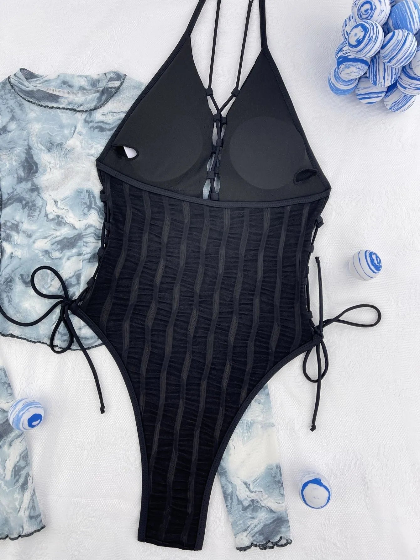 Black women's one-piece swimsuit with European American bikini styling in polyester fabric