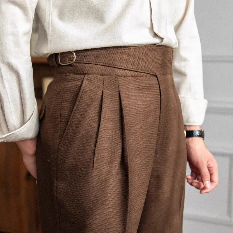 Men's high waist straight leg casual trousers in black, shown laid flat.