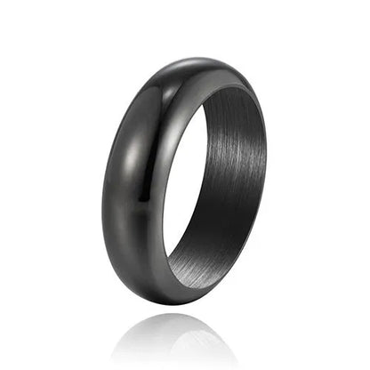 Glossy electroplated titanium steel ring in black, gold, or steel colour on finger