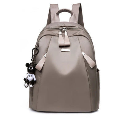 Medium square rucksack in Oxford cloth with internal organisation pockets.