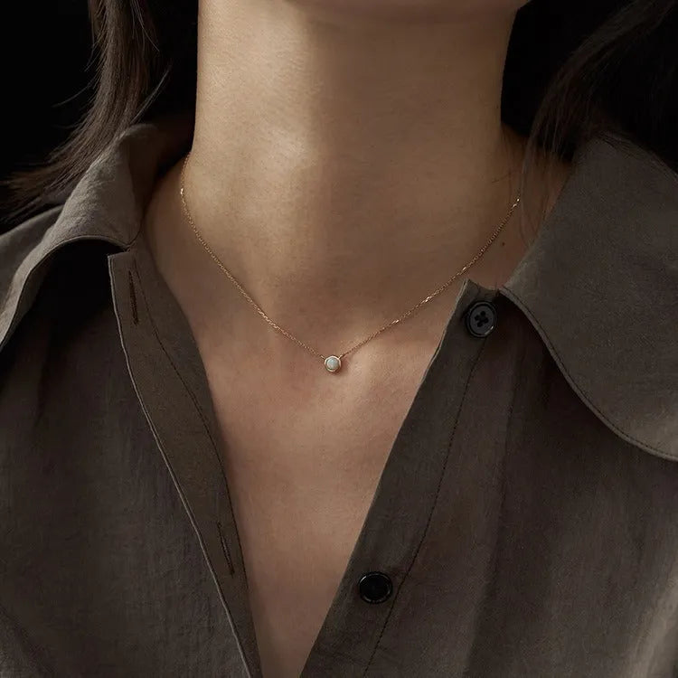 S925 sterling silver oval pendant necklace with jelly opal style, available in gold or white gold plating.