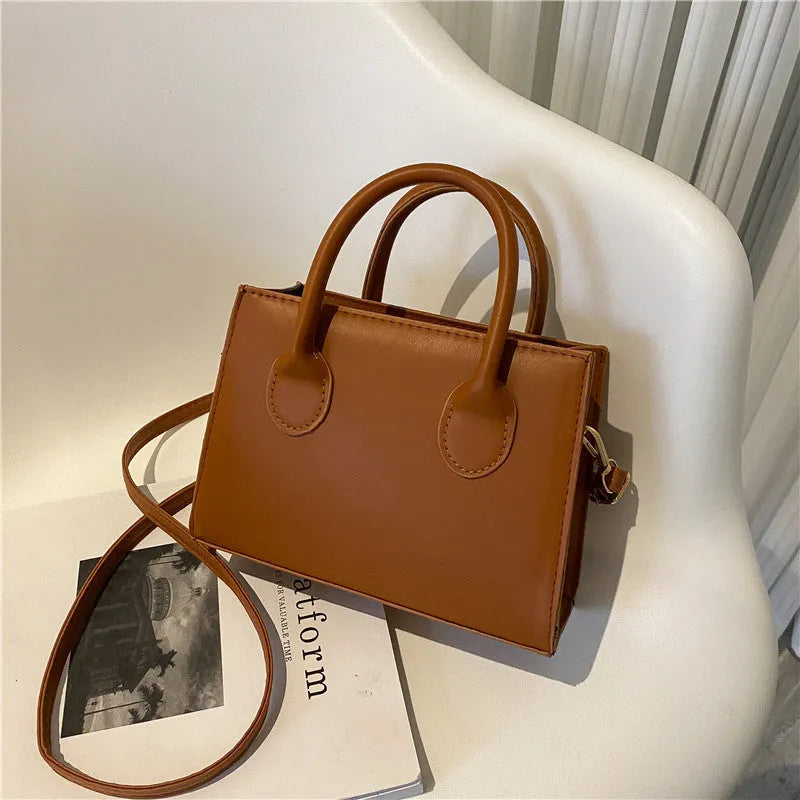 Women's small square PU leather shoulder bag in five colour options showing retro street styling
