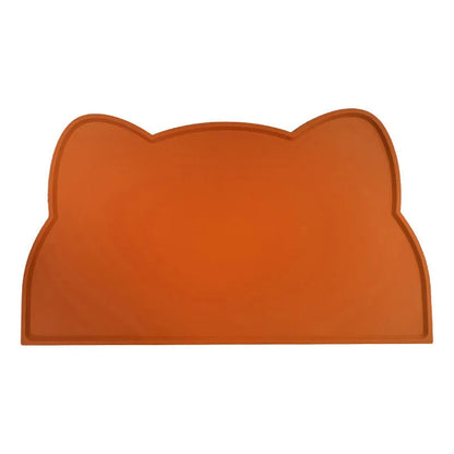 Solid-colour silicone pet feeding mat with cat head design measuring 44 by 24 centimetres