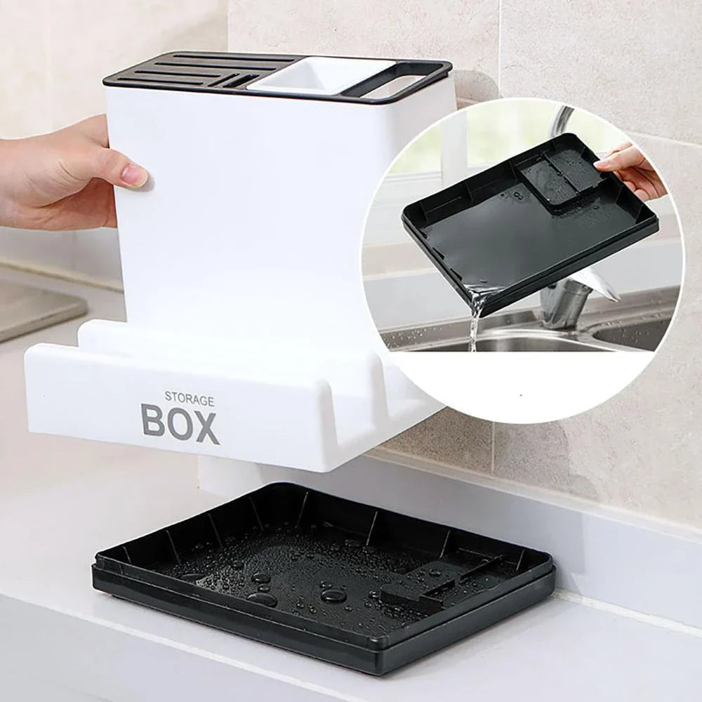 A modern, white plastic kitchen storage rack with integrated shelves for organizing cutlery, utensils, and tableware