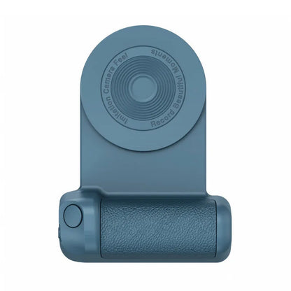 Black magnetic phone camera grip with rotatable bracket and ergonomic PU leather handle on a table.