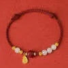 Women's Hetian jade and cinnabar red rope bracelet with adjustable 925 silver chain