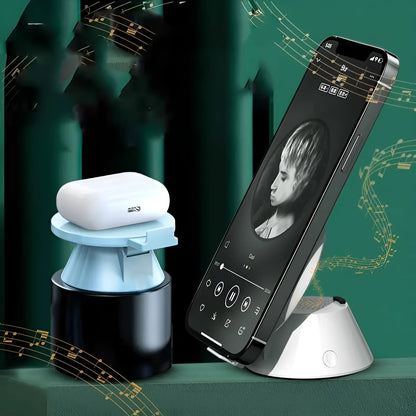 Small white plastic wireless phone charger holder with Bluetooth speaker, 12 × 10 × 6 cm, USB cable included