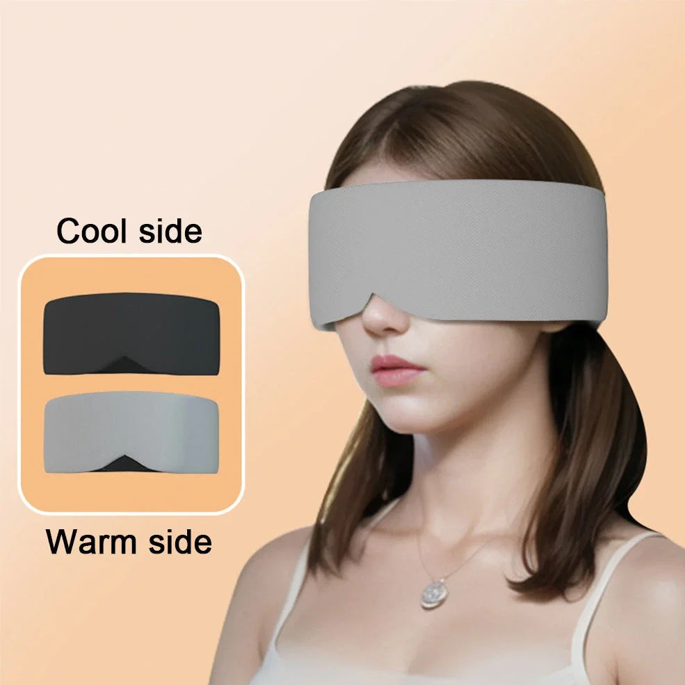 Double-sided sleep mask showing warm cotton and cooling ice silk surfaces with adjustable headband