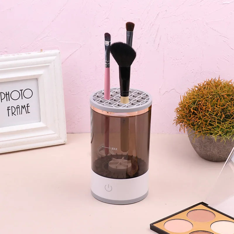 Grey and white portable electric makeup brush cleaner machine with USB charging cable