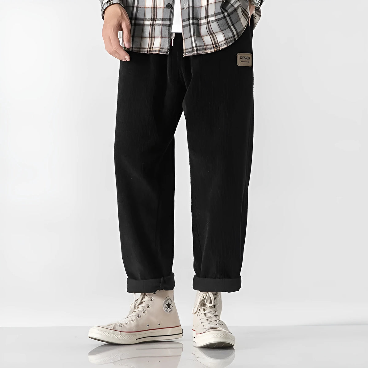Men's loose fit corduroy sports trousers in Army Green colour with straight leg design and elasticated waist