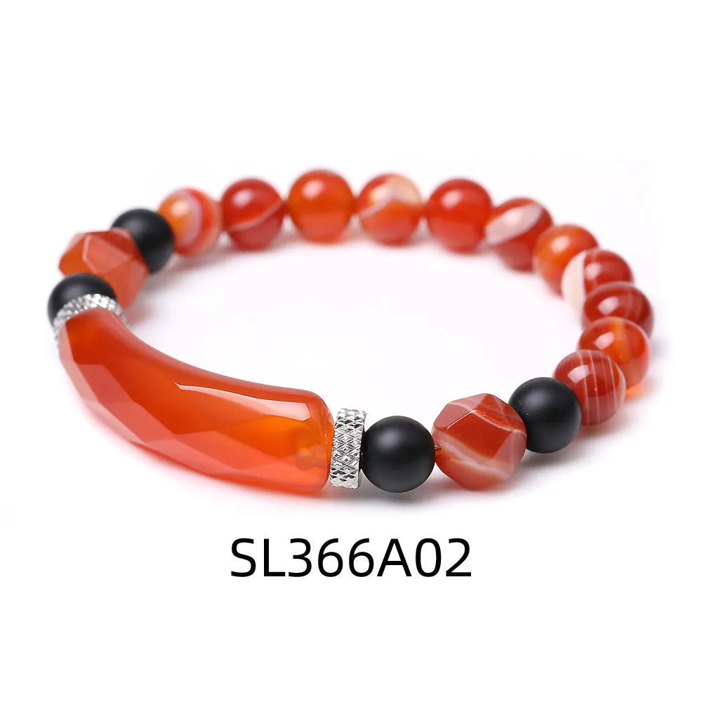 Handmade diamond-shaped cut black agate geometric bracelet showing fan-shaped bead arrangement.