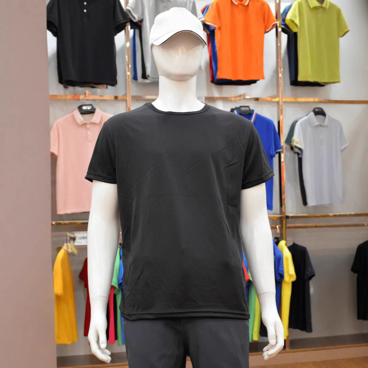 Men's slim fit quick-drying short sleeve t-shirt in a solid colour on a hanger.