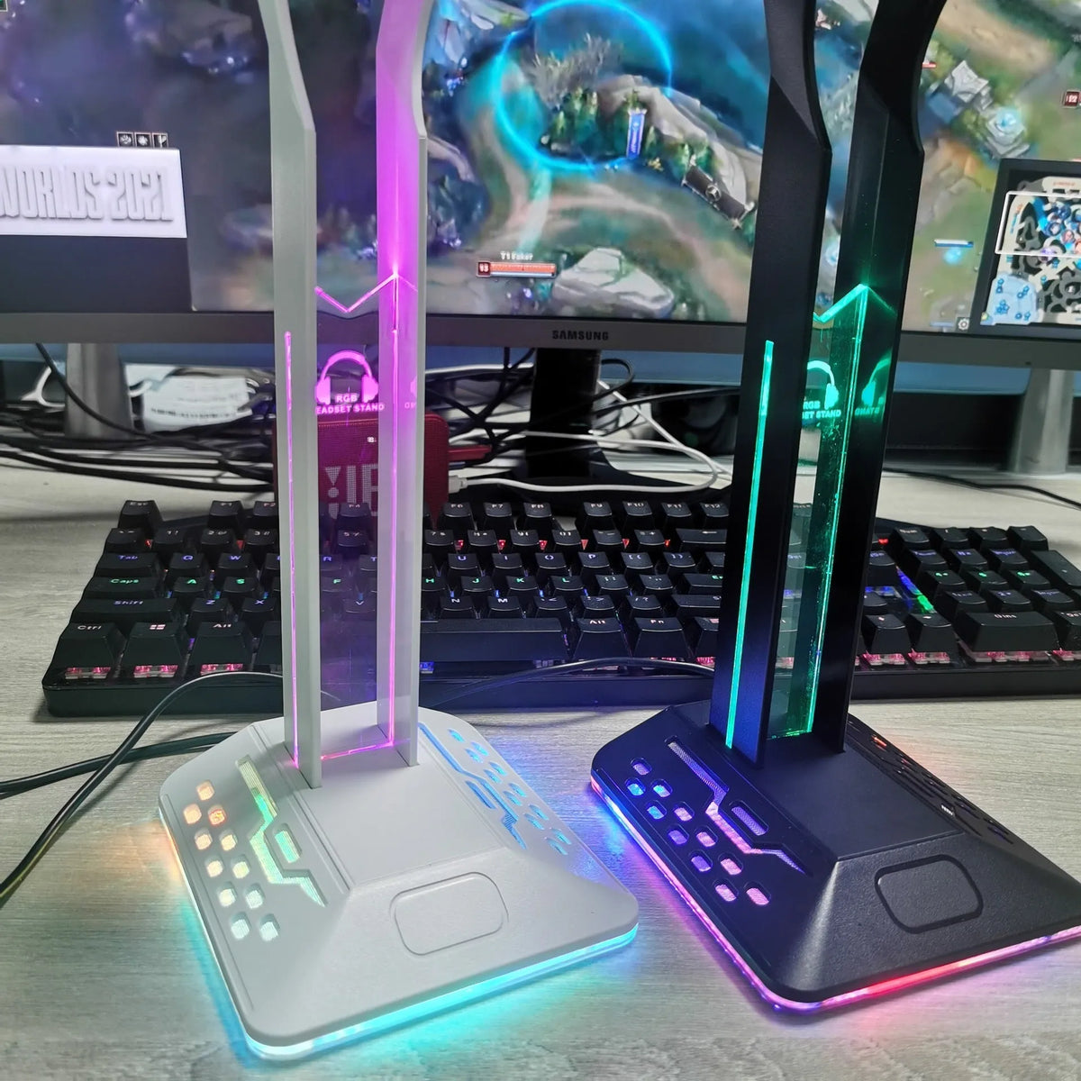 RGB colour changing headset bracket stand with dual USB ports on a desktop