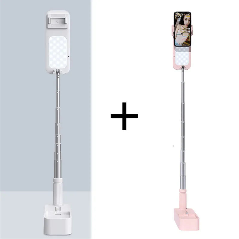 Pink floor-standing fill light with telescopic aluminium alloy stand and wireless remote for mobile phone live streaming.