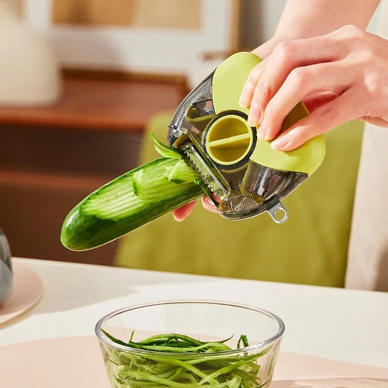 3-in-1 stainless steel peeler shredder with ergonomic handle for kitchen use