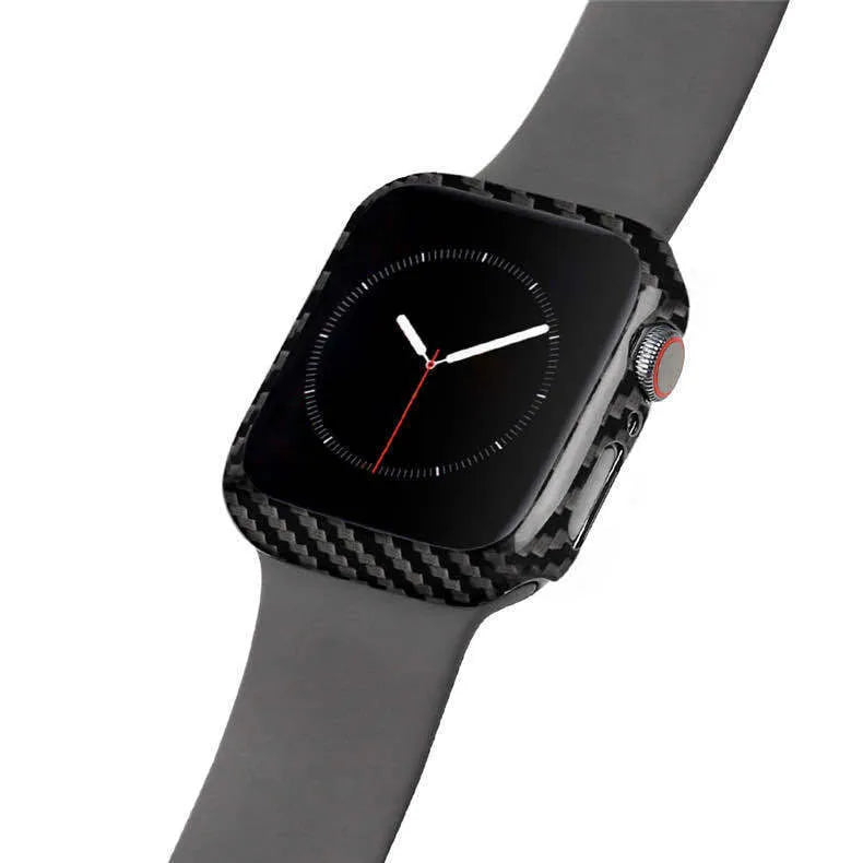 Apple Watch Series 4 in a black carbon fibre case with a leather half-wrap on a wrist