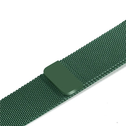 Stainless steel Apple Watch strap in silver on a wrist, showing the metal links and secure clasp.