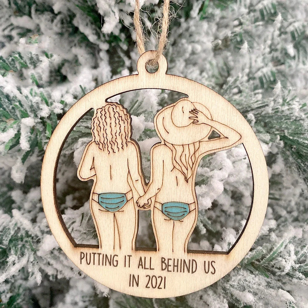 Laser-cut wooden Christmas tree pendant with lovers, snowman, and deer designs