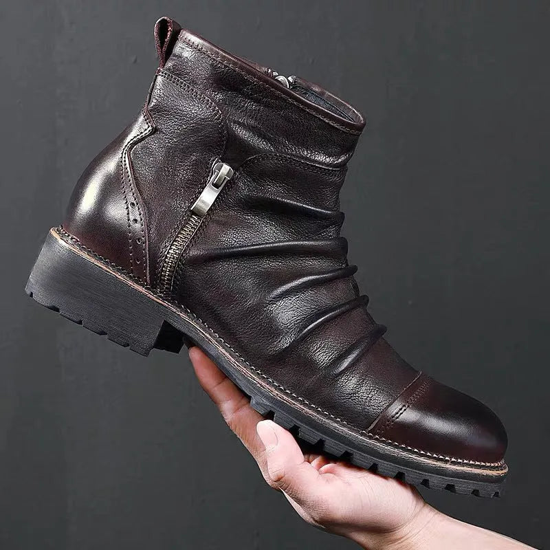 Black mid-calf cowboy boots with side zipper, round toe, and a horseshoe-shaped heel.