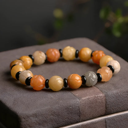 Hetian Natural Jinsi Jade pumpkin beads bracelet with geometric shape and auspicious patterns.
