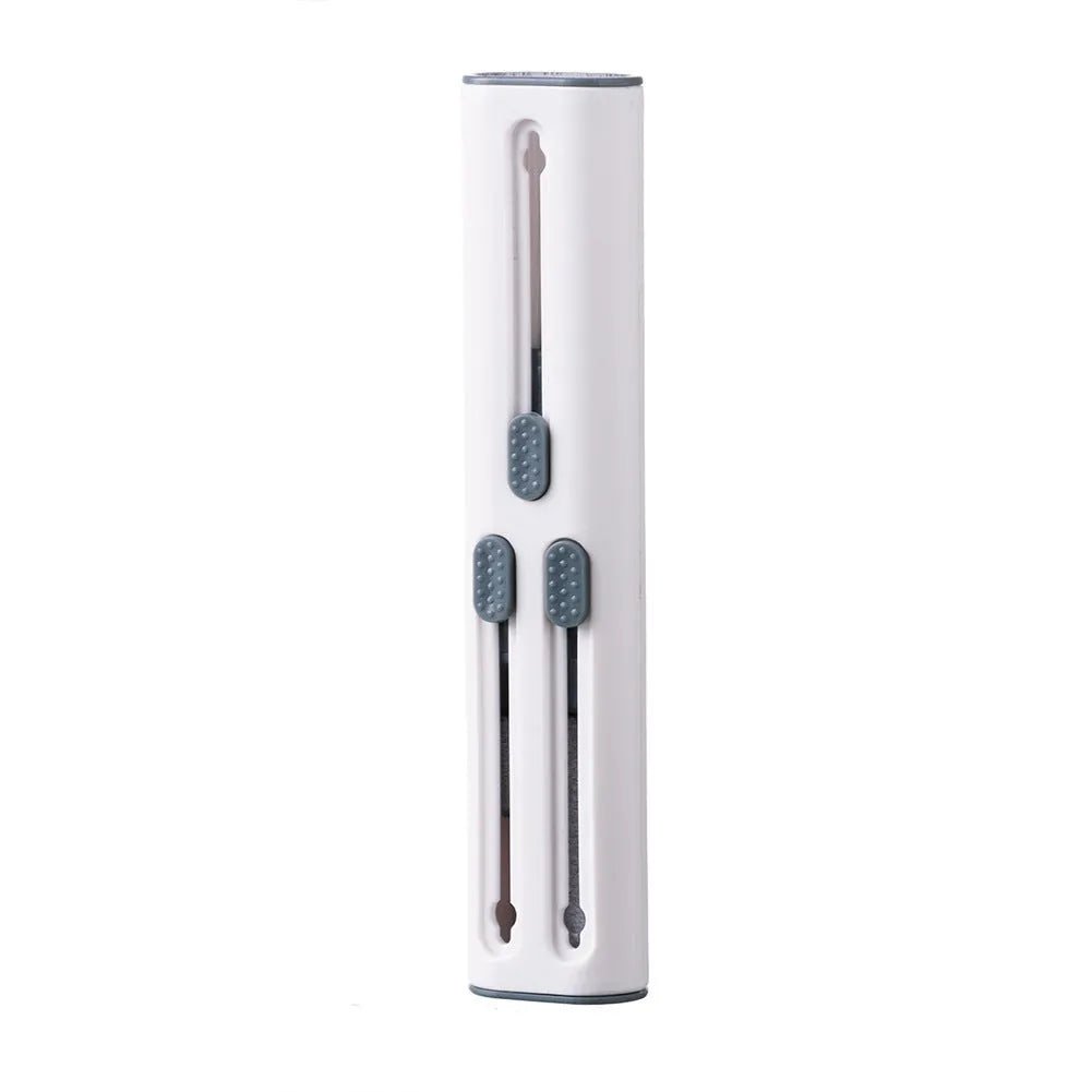 Black and white plastic earbud cleaning pen with a brush for headphones and mobile phones