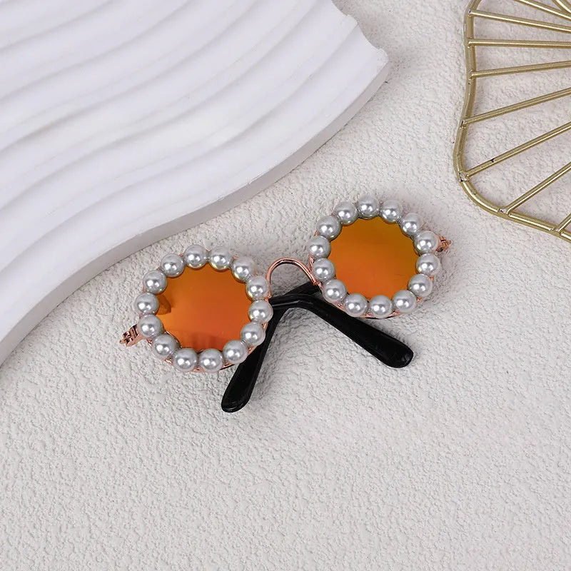 Pearl-trimmed round sunglasses for cats and dogs in five colour options