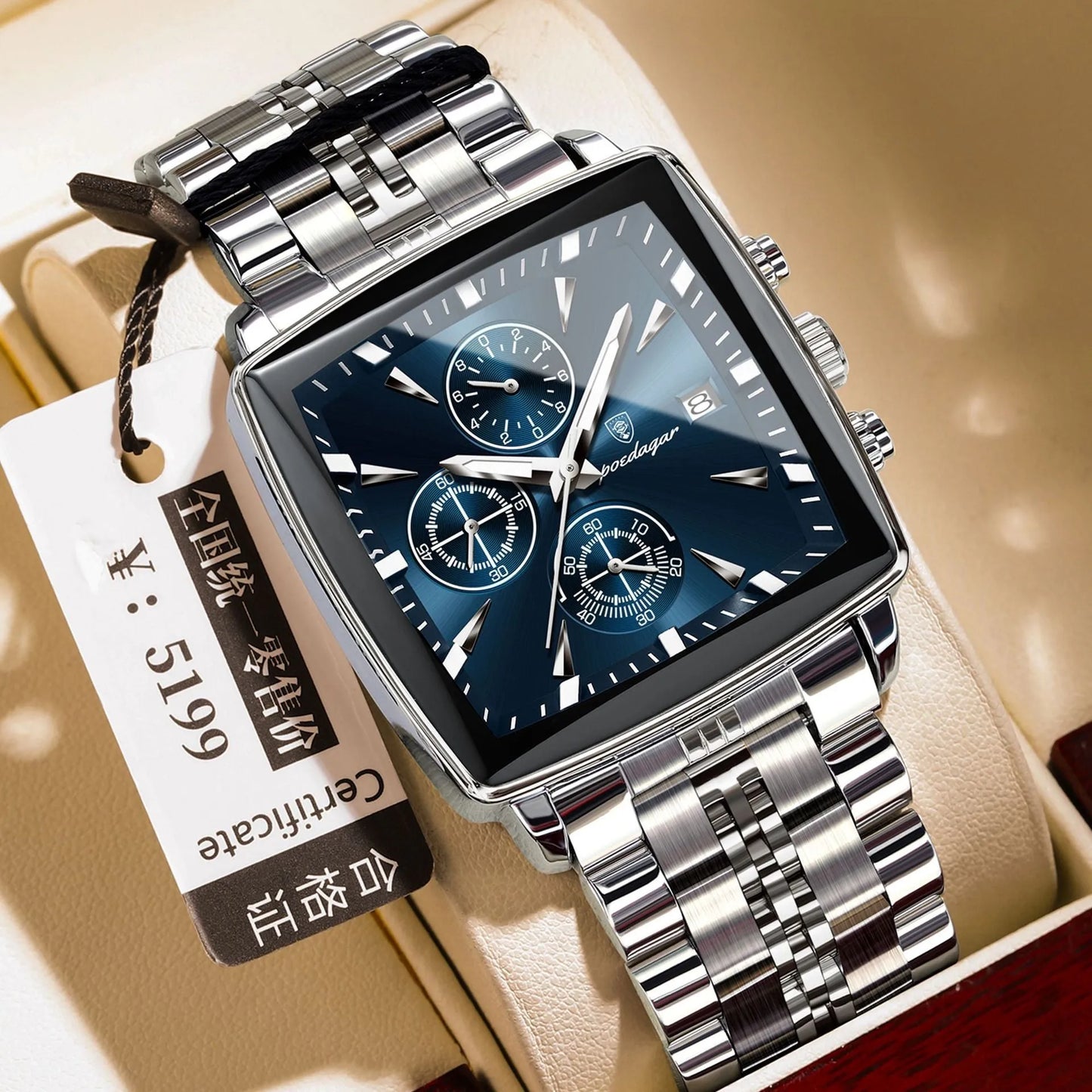 Square men's business watch with stainless steel strap and alloy case in a gold and blue colour variant.
