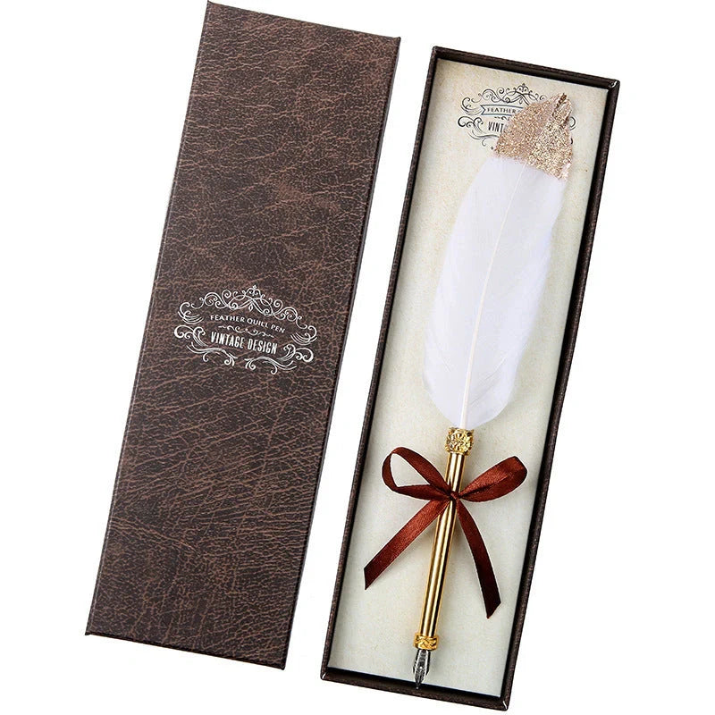 Elegant retro feather pen in a luxury gift box, featuring a sleek stainless steel casing and a stunning array of authentic feather designs.