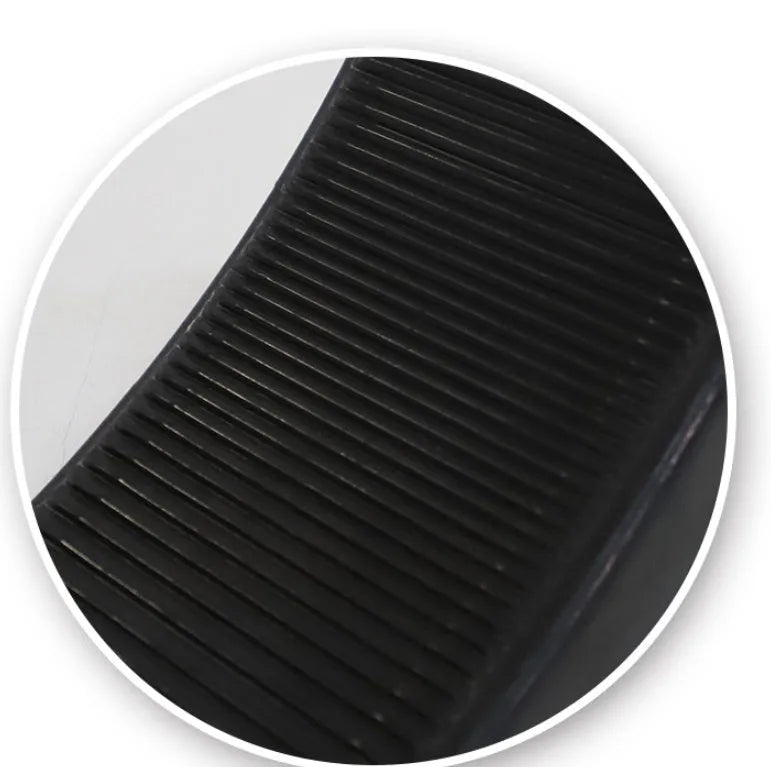 Portable car anti-slip retainer wedge with isosceles triangle design on a ramp.