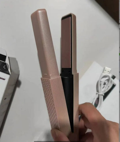 Pink and green cordless mini USB hair straightener and curler with ceramic plates.