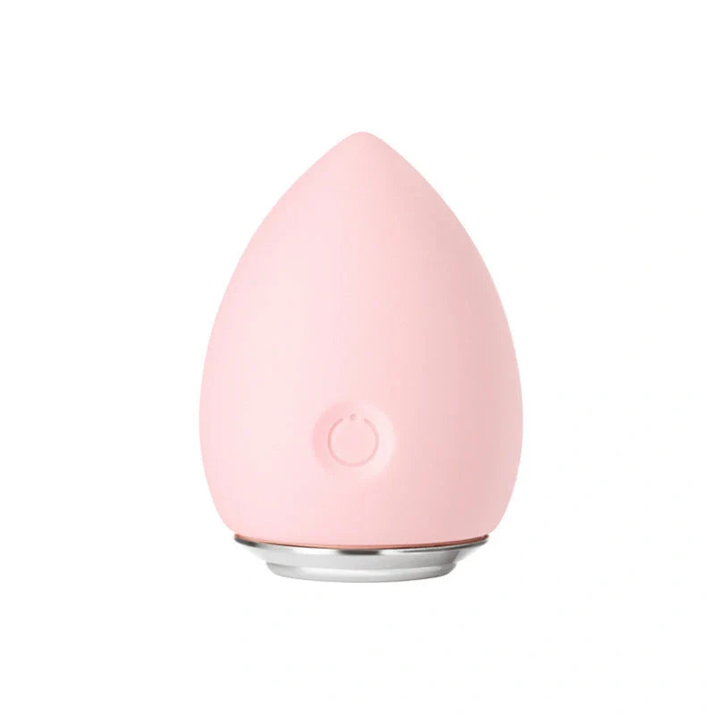 Electronic Cleansing Egg in pink and blue, compact beauty tool for deep skin cleansing