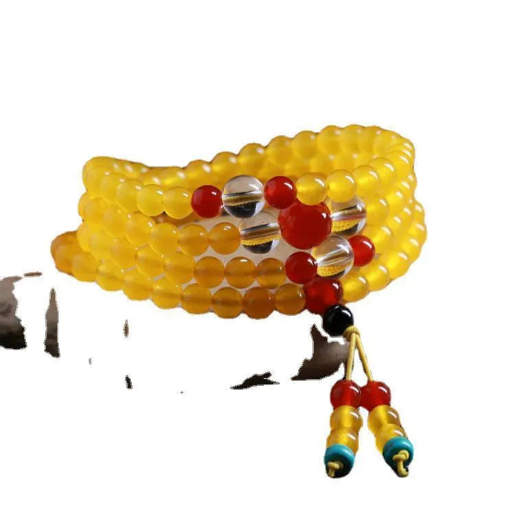 Crystal canary stone 108-bead necklace and bracelet set with geometric beads and lucky cat charm.