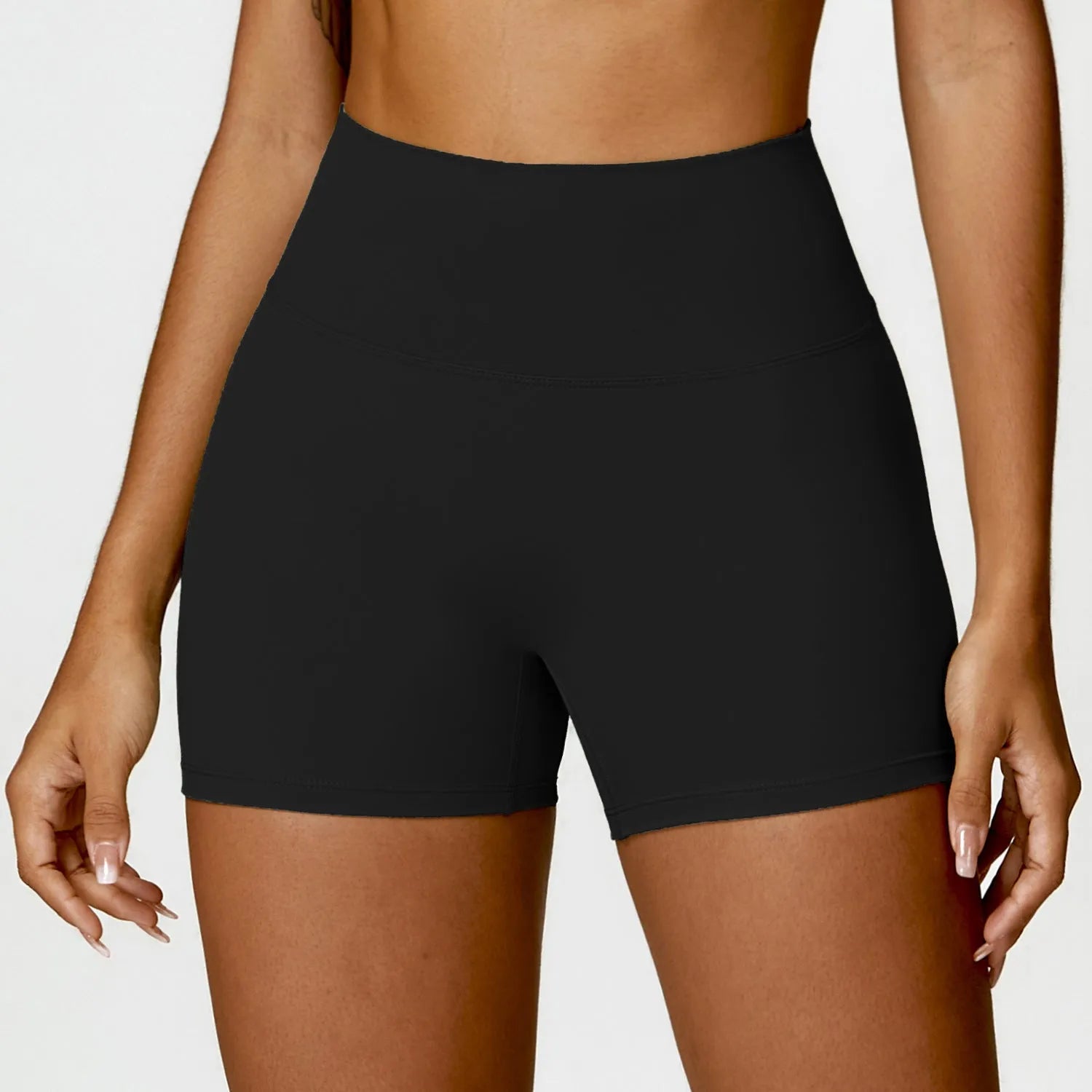 Women's high waist yoga shorts in nylon fabric with belly contracting design and hip lifting cut