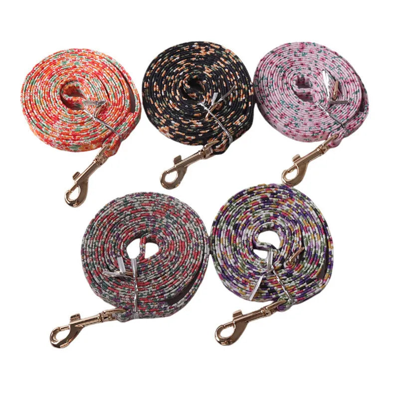 Orange cloth dog harness and leash set from the floral series, showing the single chest back design.