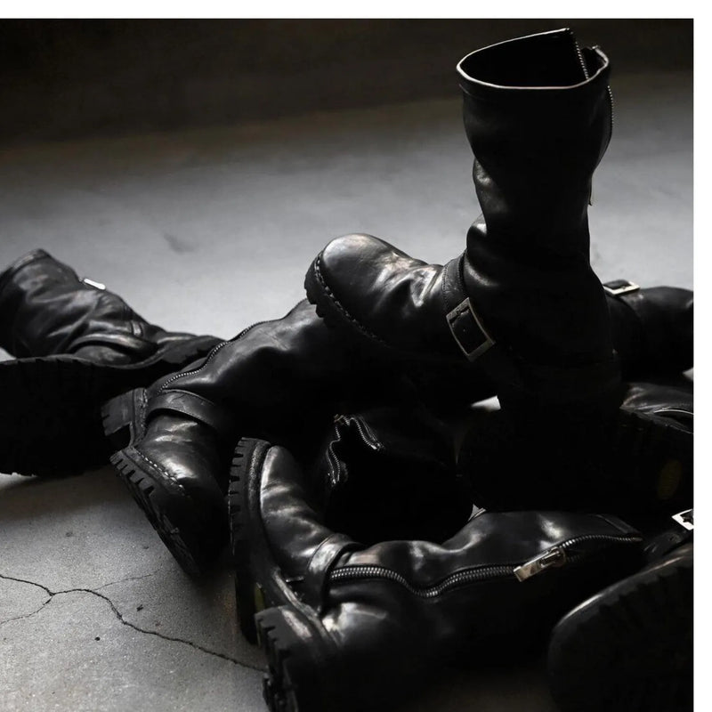 Men's Retro Martin Boots with genuine leather black or microfiber black upper, zip closure, round toe styling, and available in six sizes from 39 to 44 for a practical dark style footwear option.
