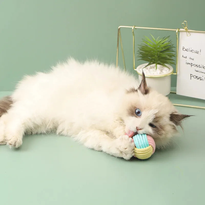 Handmade blue powder, green blue, and pink green plush cat toy ball with dental floss core for teeth grinding