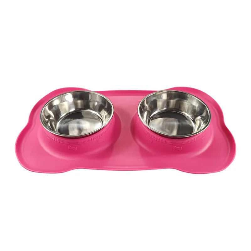 Large silicone dog bowl with stainless steel insert in five colour options on kitchen floor