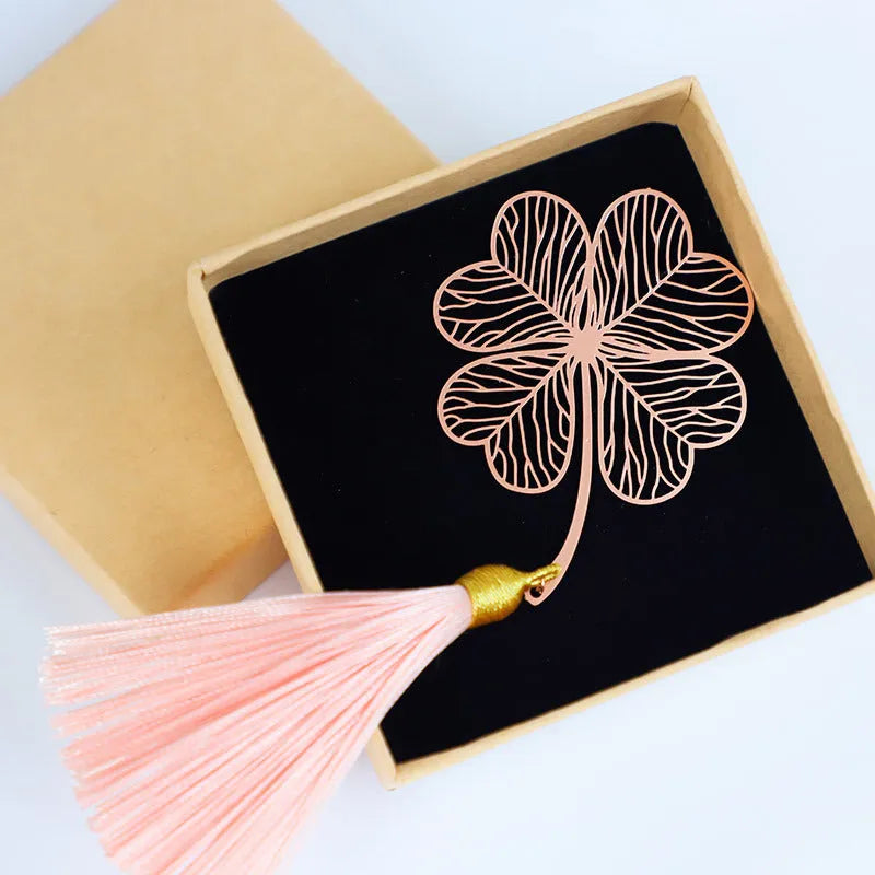 Brass metal bookmark with hollow plating leaf design and rose gold tassel decoration