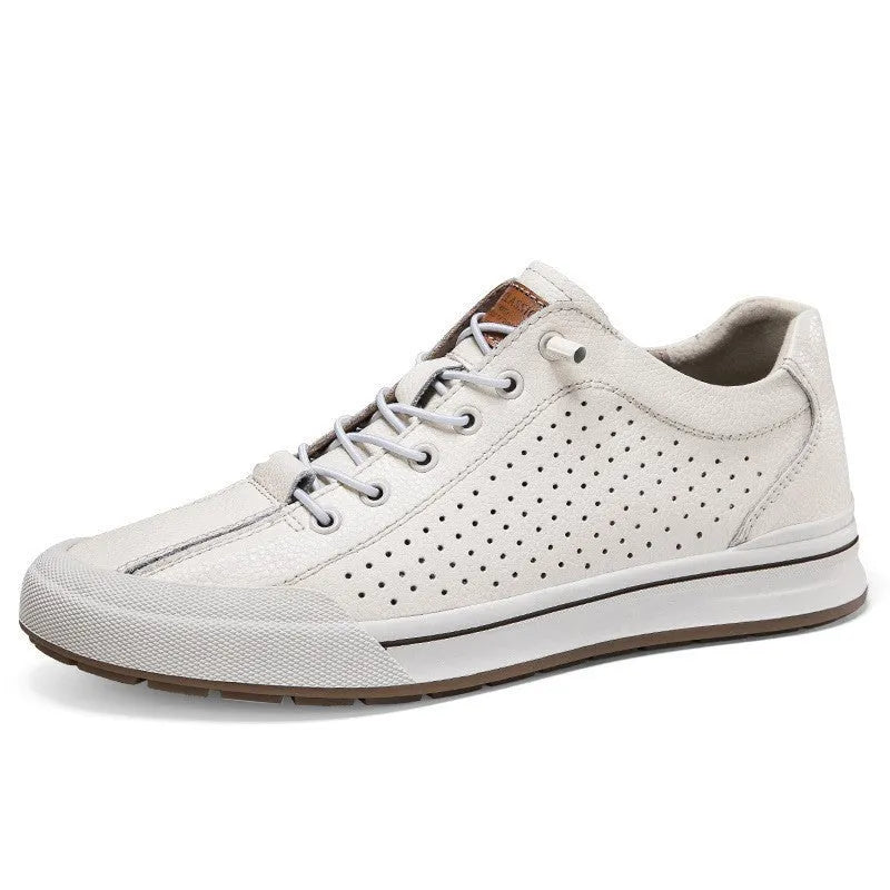 Men's classic white and black matte leather plimsolls with round toe and flat 6CM heel on a plain background.