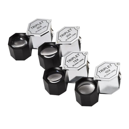 Handheld metal magnifying glass with optical glass lens for jewellery and coin inspection.