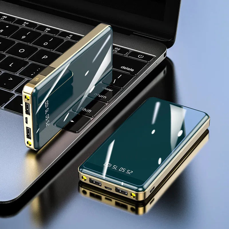 Square-shaped 20000mAh power bank with digital display screen showing battery percentage.