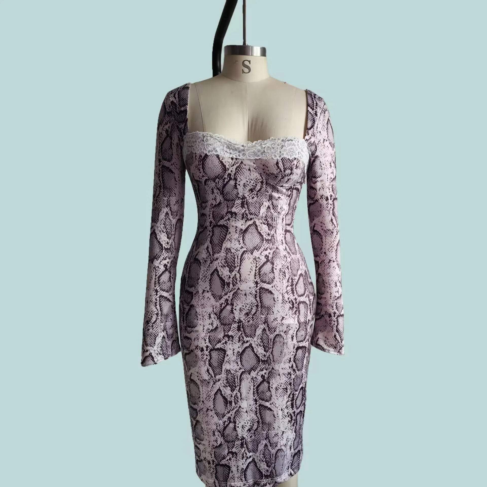 Grey lace dress with 3D floral digital print, A-line skirt, and long slim-fit sleeves on a mannequin.