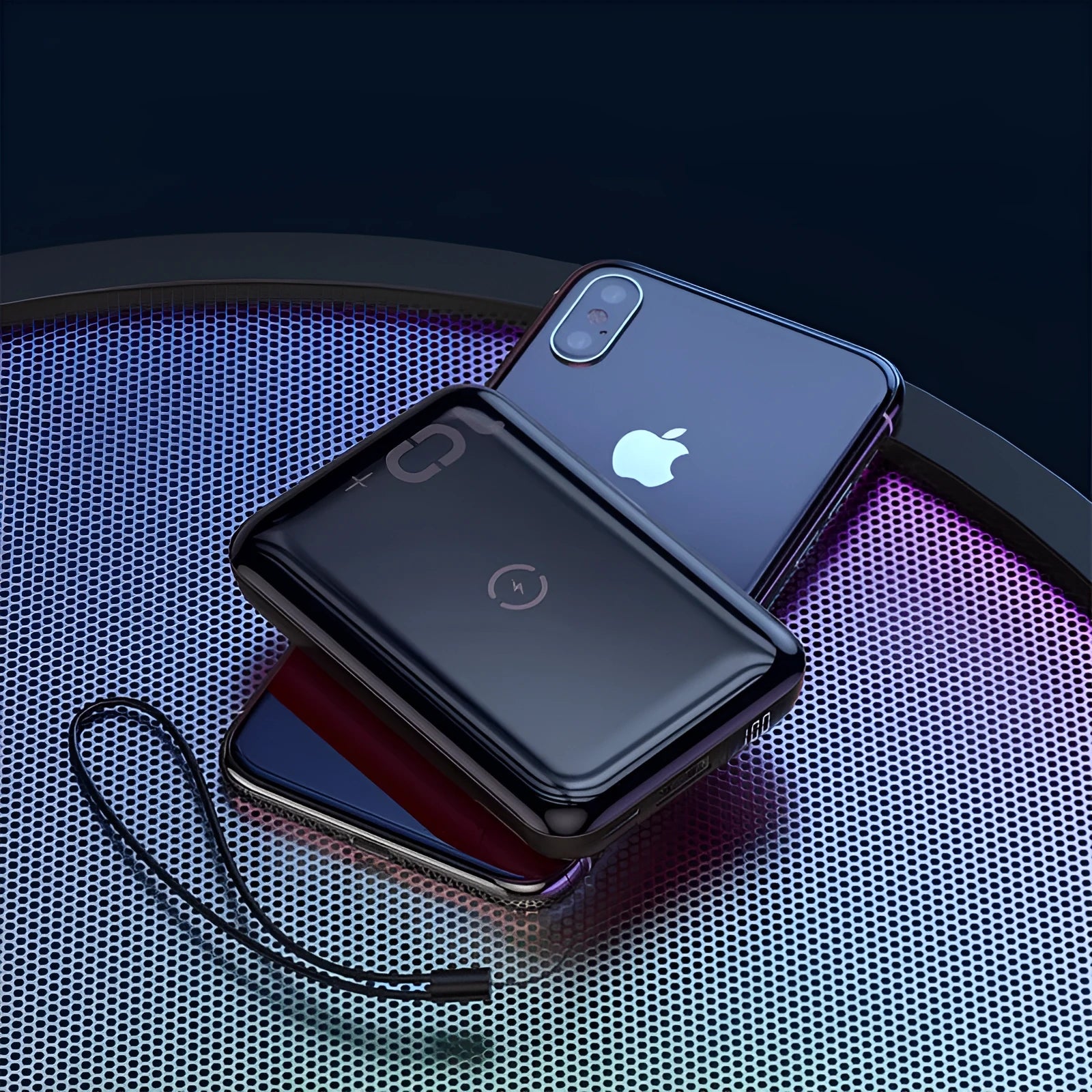 Small square black wireless charging power bank with LED display showing battery percentage.