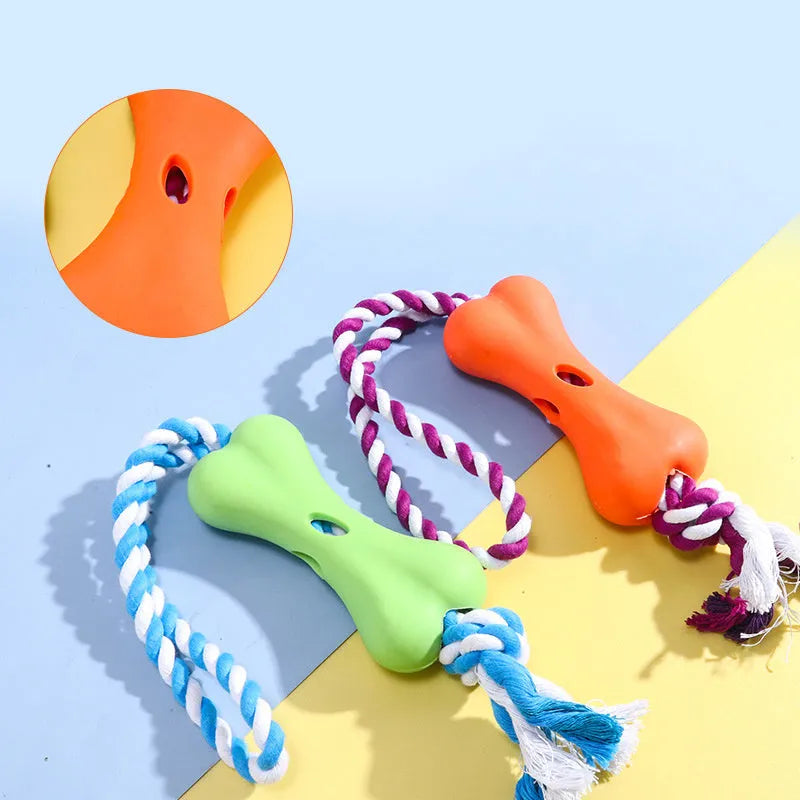 Green porous bone dog toy with knotted rope, hollow for treats, measuring 138mm