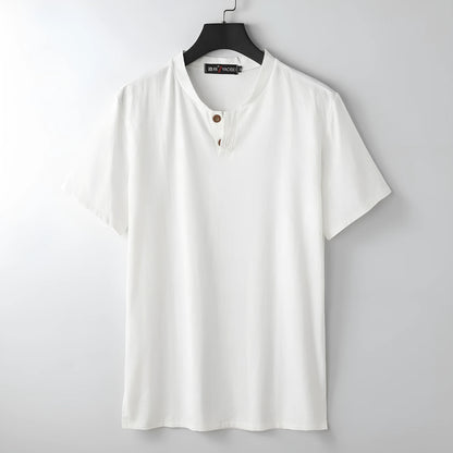 Women's loose fit apricot cotton V-neck short sleeve pullover top on a hanger.