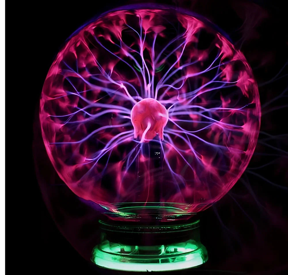 Plasma lightning ball with electrostatic induction showing colourful electrical discharges on glass surface